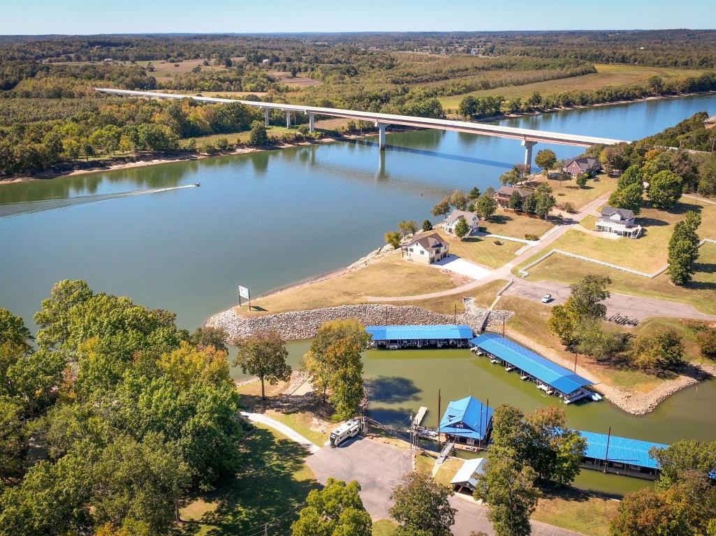 Lot 12 Riverstone Loop Bath Springs, TN 38311 - Photo 5 of 14 an aerial view of water body with boats and residential houses with outdoor space