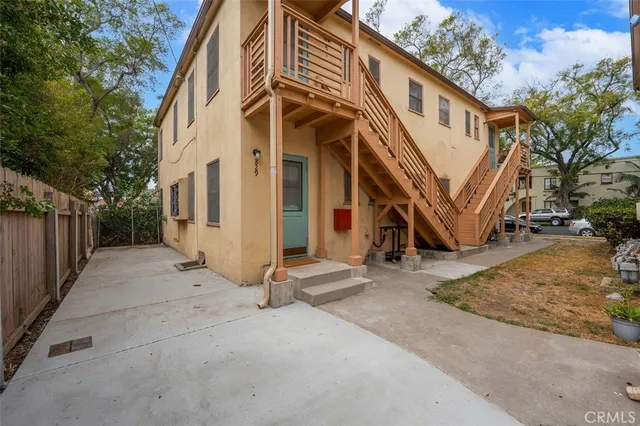 a view of a backyard of the house