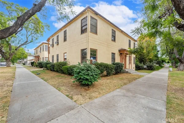 a front view of a house having yard