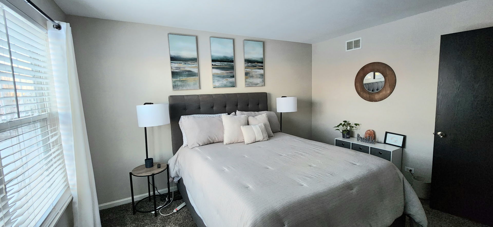 9461 Welsh Lane Huntley, IL 60142 - Photo 19 of 19 a bedroom with a bed and a window