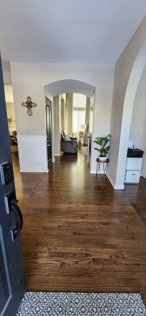 9461 Welsh Lane Huntley, IL 60142 - Photo 2 of 19 a view of living room with furniture and floor to ceiling window