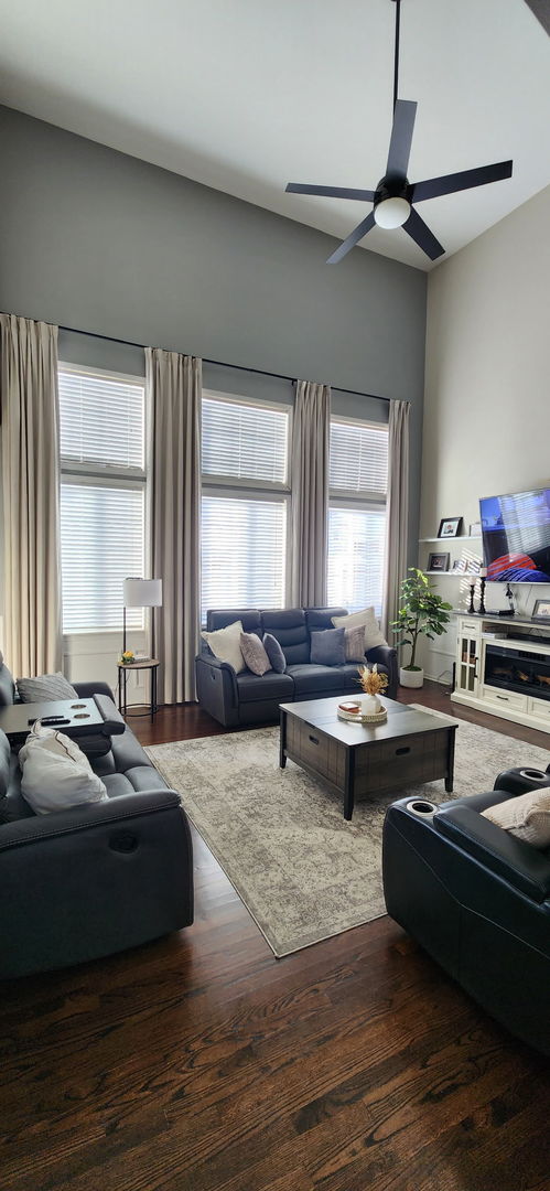 9461 Welsh Lane Huntley, IL 60142 - Photo 3 of 19 a living room with furniture flat screen tv and window