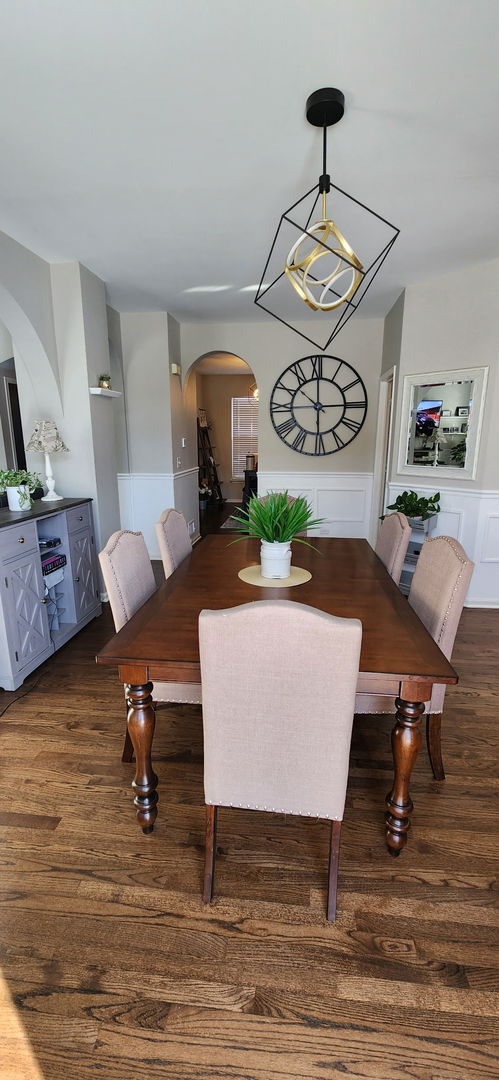 9461 Welsh Lane Huntley, IL 60142 - Photo 6 of 19 a living room with furniture and a wooden floor
