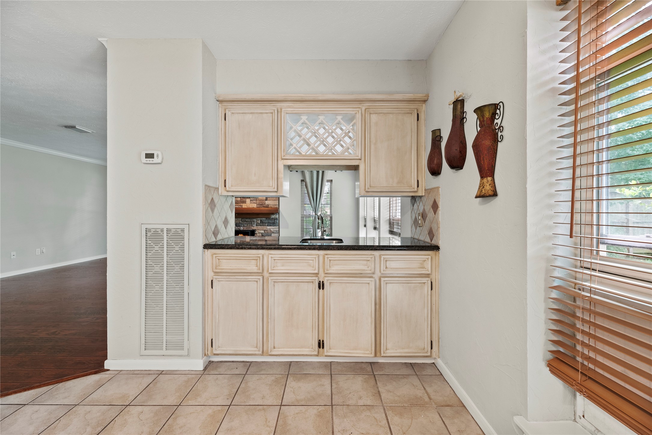 7403 Foxton Pl Court Houston, TX 77095 - Photo 12 of 41 A handy feature for entertaining, the wet bar offers storage and display space for your favorite vino and stemware, along with a convenient sink for mixing and serving drinks.