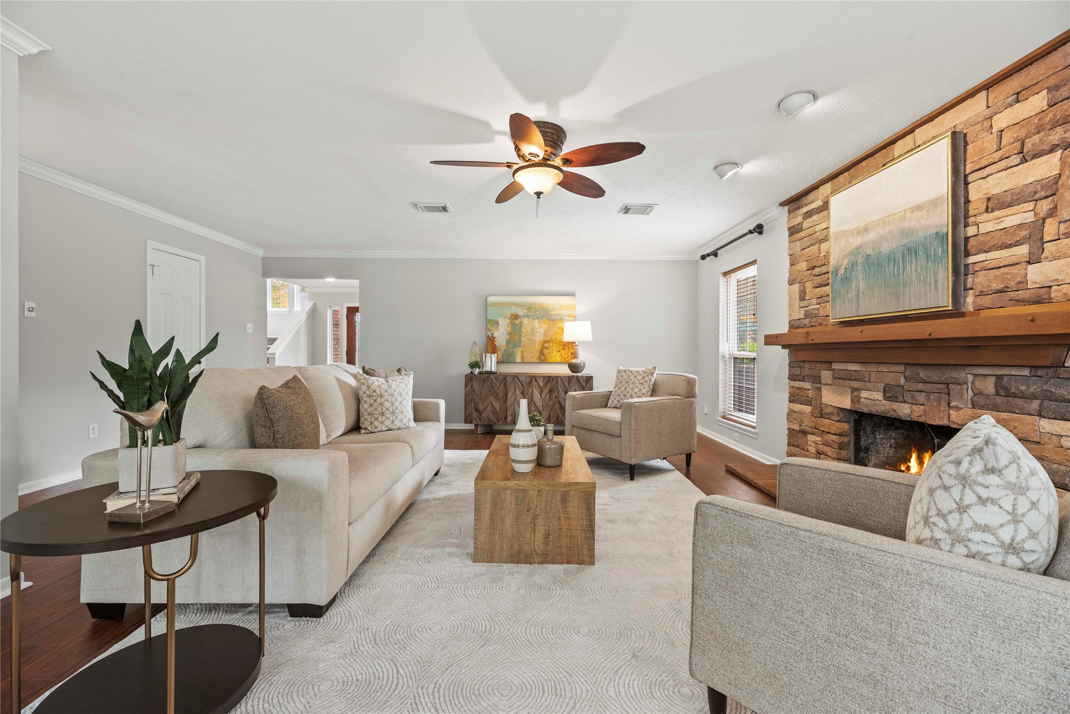 7403 Foxton Pl Court Houston, TX 77095 - Photo 10 of 41 This very spacious family room offers wood-look laminate flooring, neutral paint, and an open design that easily
accommodates oversized furnishings, providing plenty of space to gather, entertain, or simply unwind.