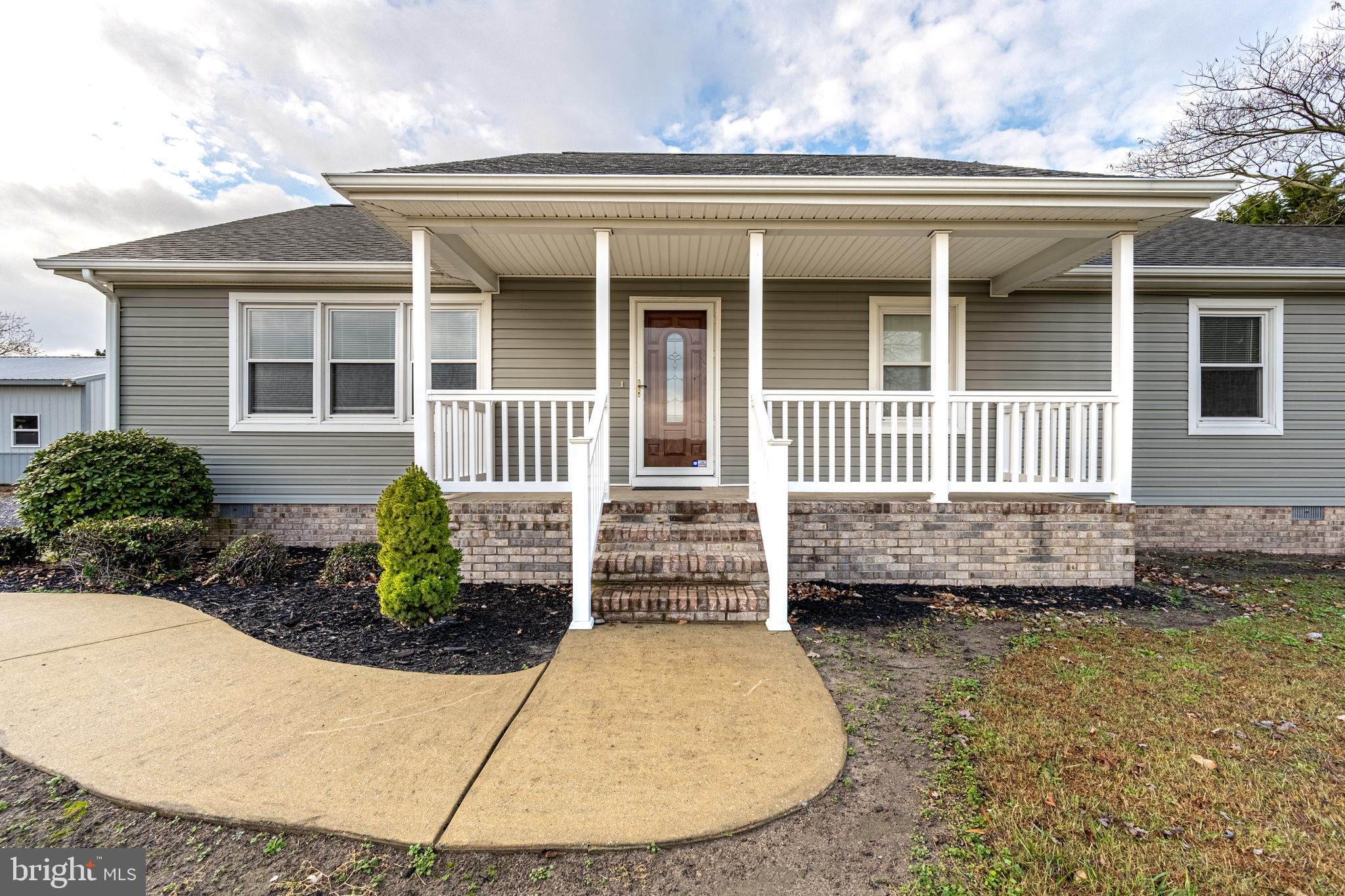26792 Porter Mill Road Hebron, MD 21830 - Photo 2 of 91 front view of a house with a yard