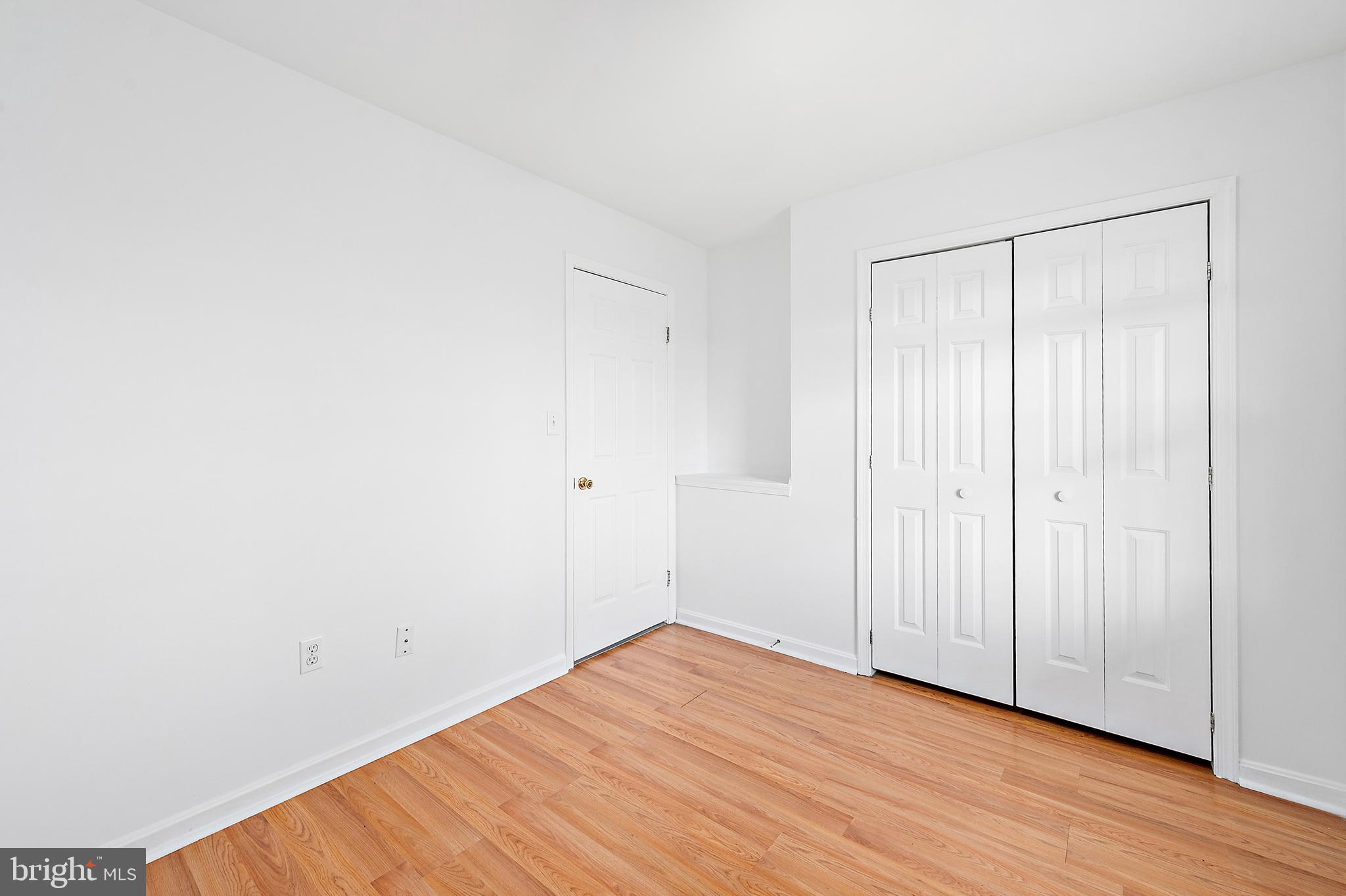 26792 Porter Mill Road Hebron, MD 21830 - Photo 25 of 91 a view of an empty room with wooden floor