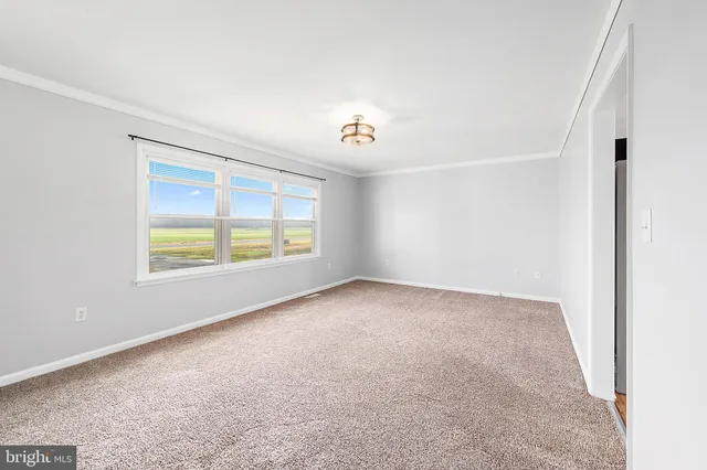 a kitchen with stainless steel appliances granite countertop a refrigerator sink and cabinets