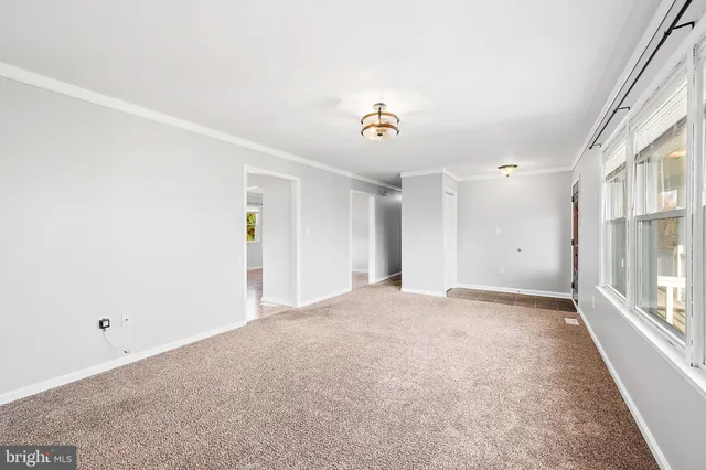 a kitchen with a sink and a stove top oven