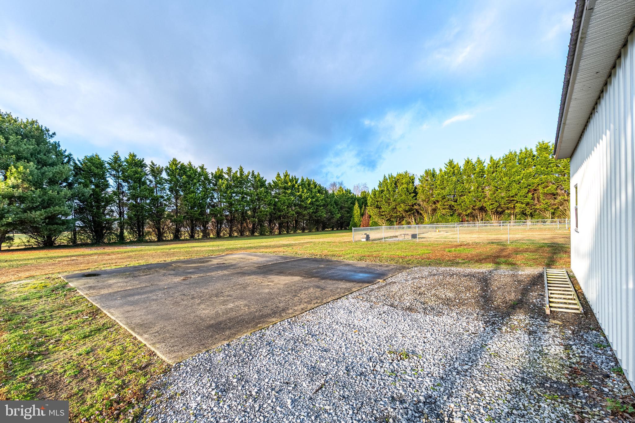 26792 Porter Mill Road Hebron, MD 21830 - Photo 88 of 91 a view of swimming pool with an outdoor space and seating area