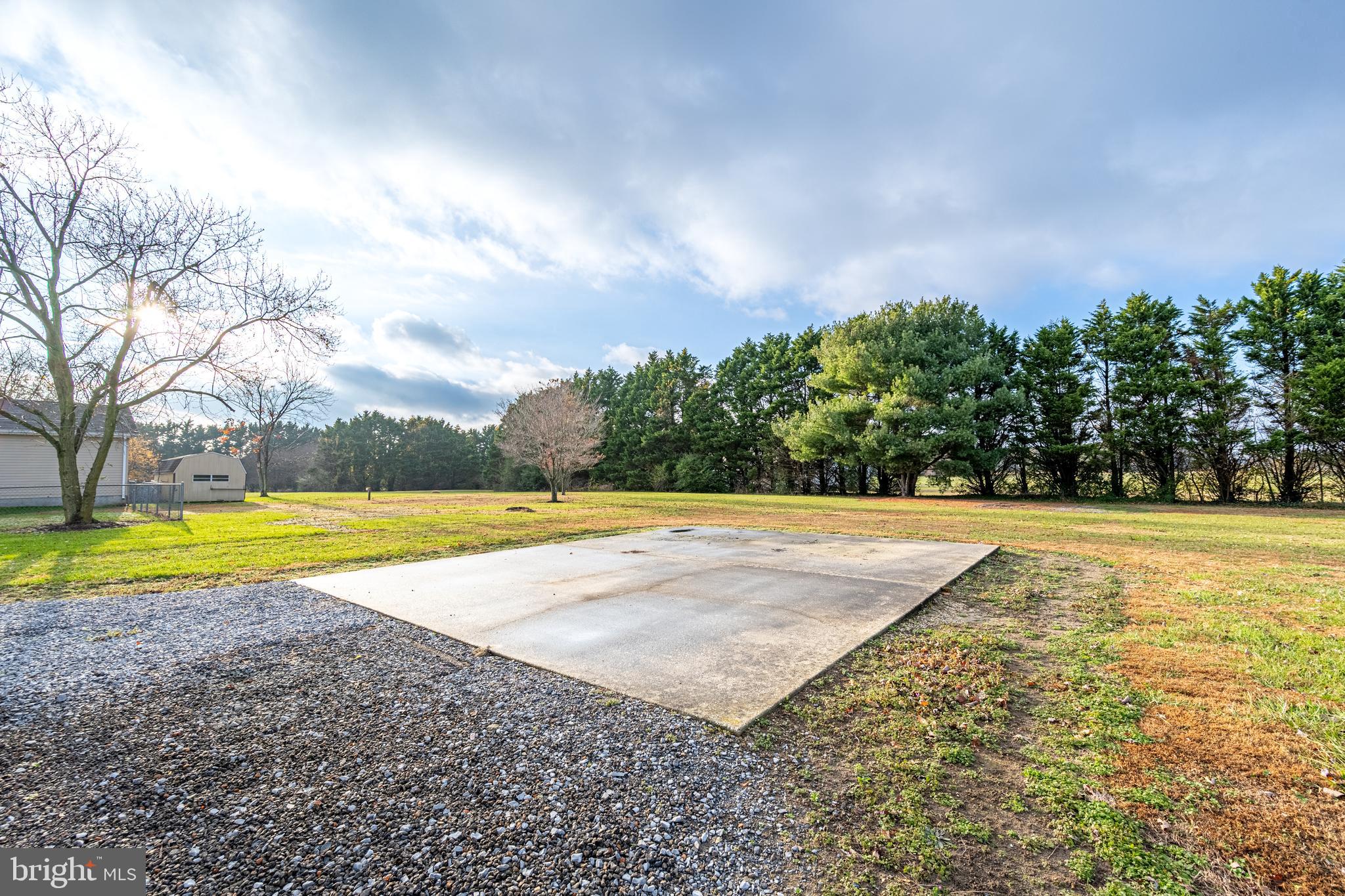 26792 Porter Mill Road Hebron, MD 21830 - Photo 89 of 91 a view of swimming pool with an outdoor space and seating area