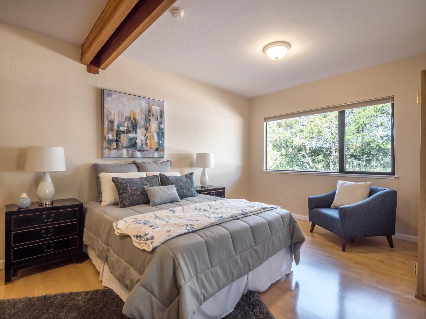 895 Rider Ridge Road Santa Cruz, CA 95065 - Photo 37 of 46 a bedroom with a bed and a window