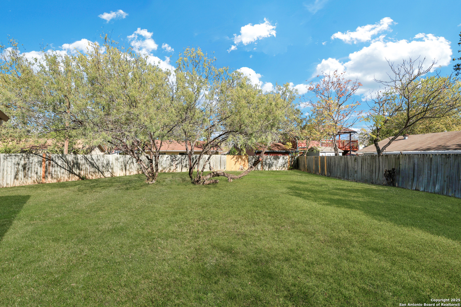 7103 Spring Point Street San Antonio, TX 78249 - Photo 25 of 28 a view of a big yard
