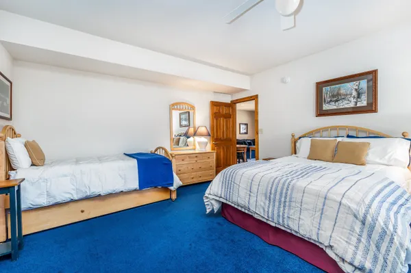 a kitchen with stainless steel appliances granite countertop a sink and wooden cabinets