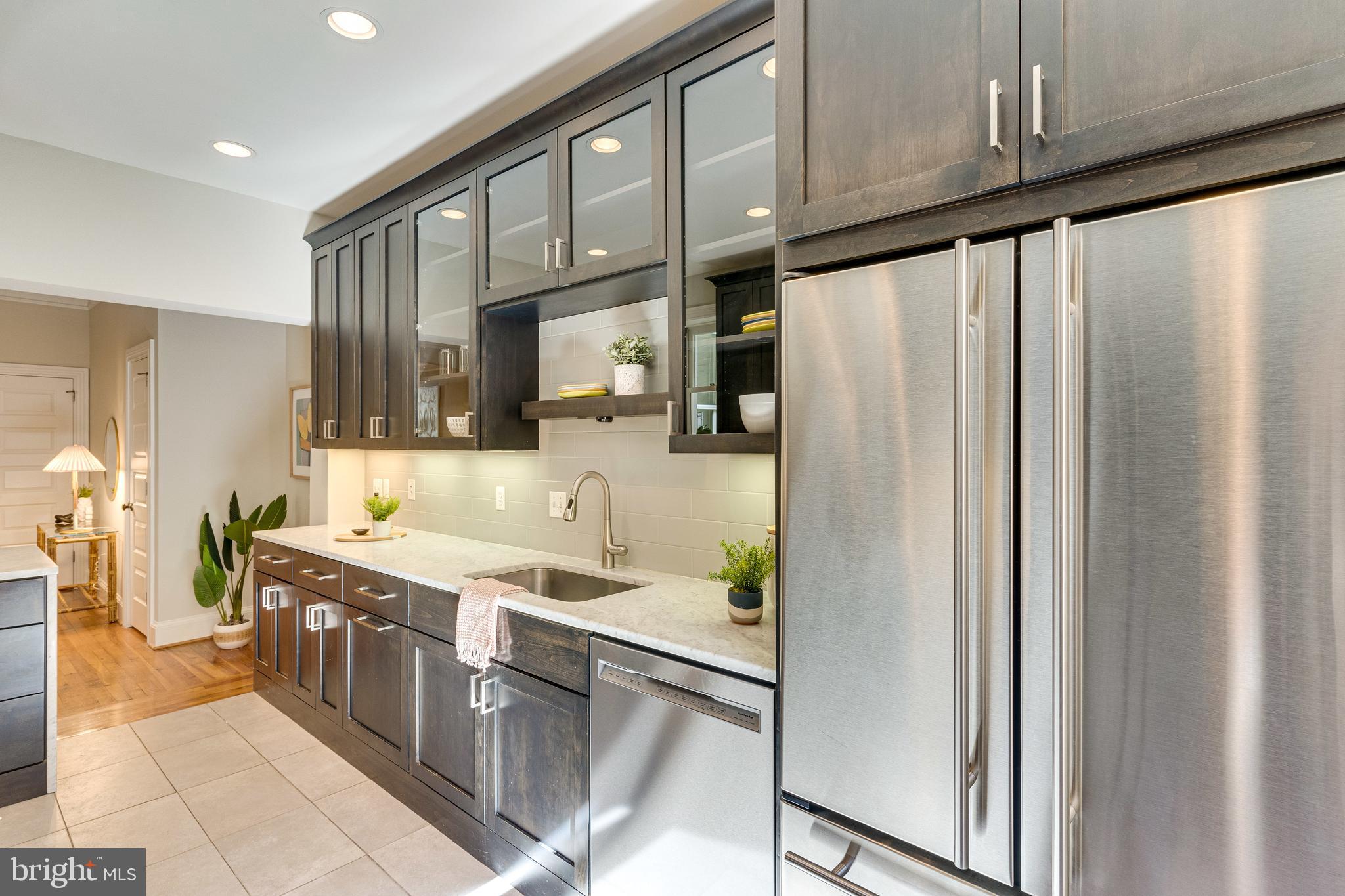 139 12th Street Northeast Washington, DC 20002 - Photo 17 of 50 a bathroom with a sink a mirror and a shower