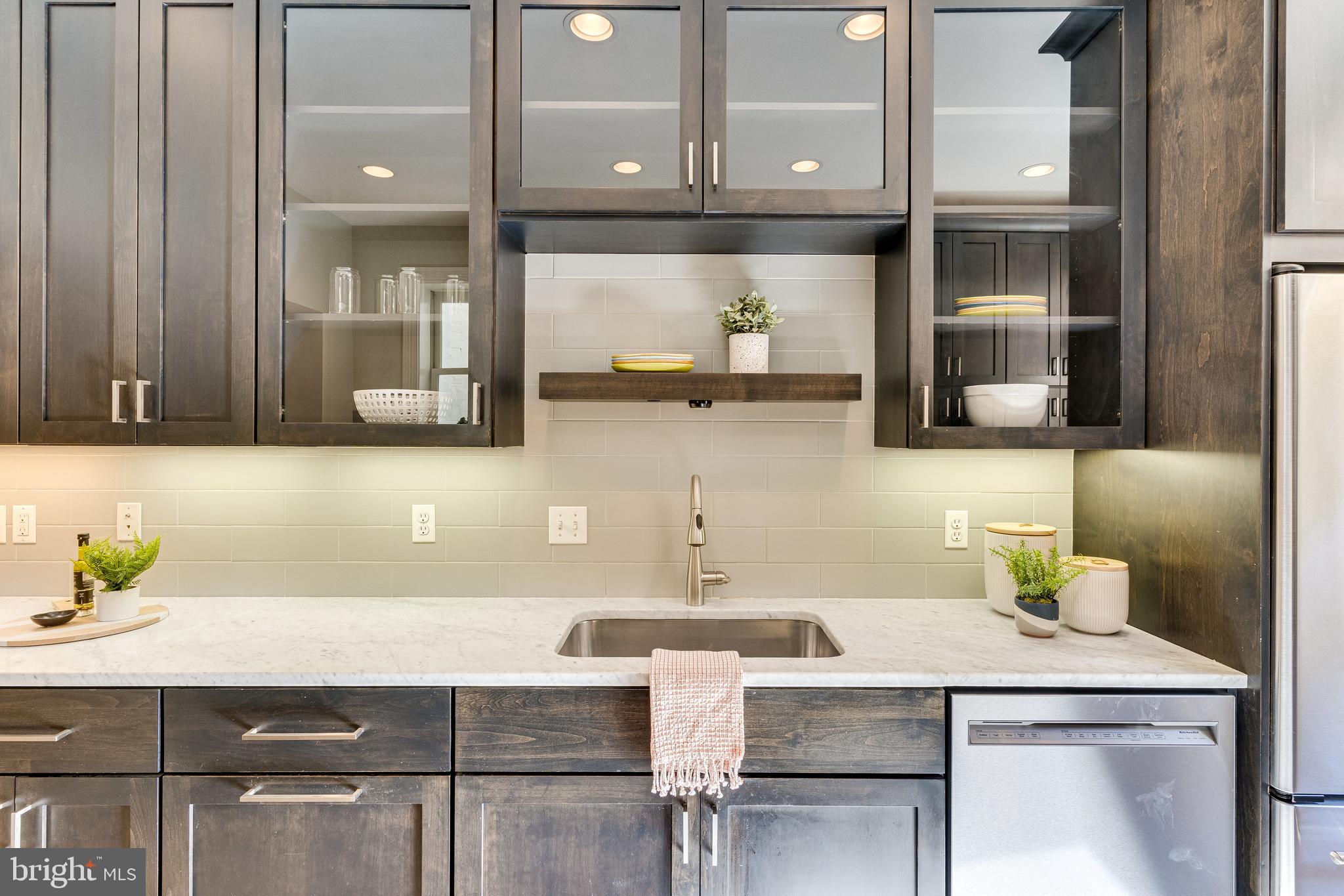 139 12th Street Northeast Washington, DC 20002 - Photo 18 of 50 a bathroom with a sink and a mirror