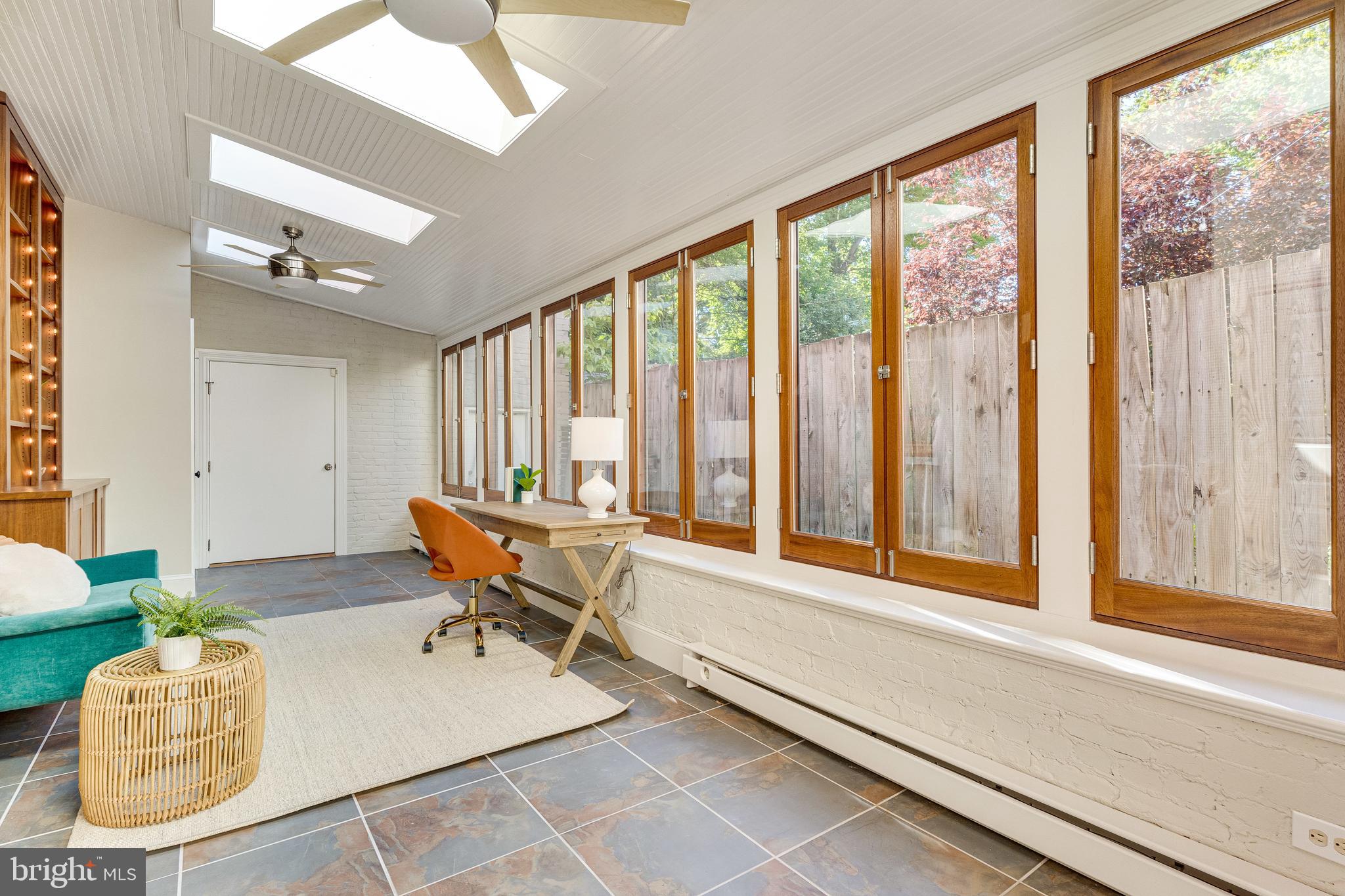 139 12th Street Northeast Washington, DC 20002 - Photo 21 of 50 a living room with furniture and a large window