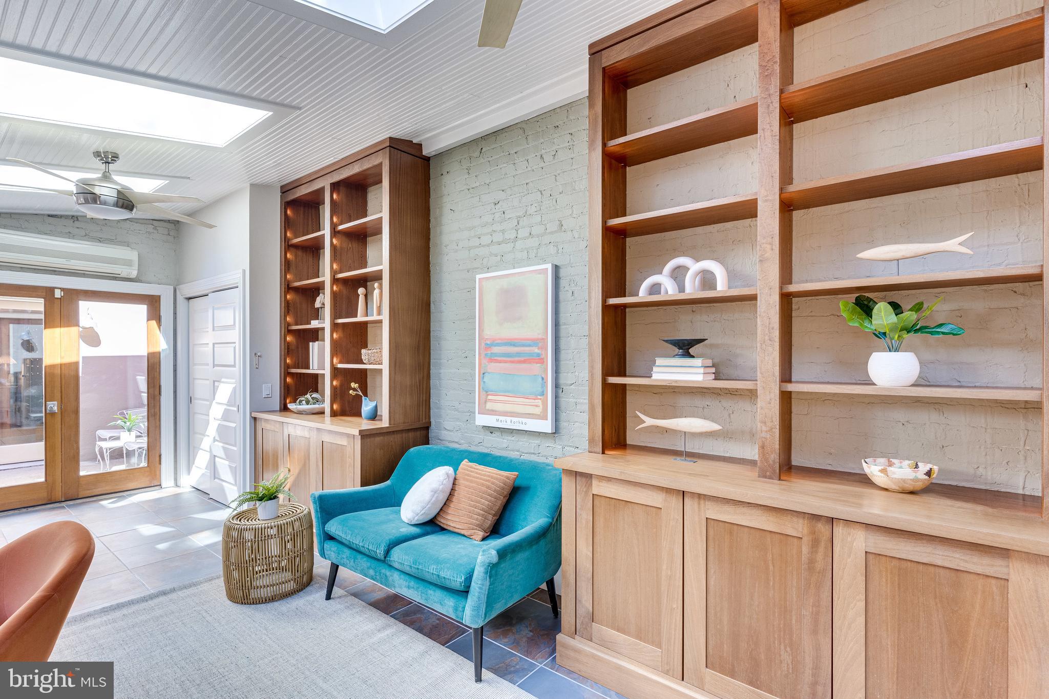 139 12th Street Northeast Washington, DC 20002 - Photo 23 of 50 a living room with furniture cabinets and window