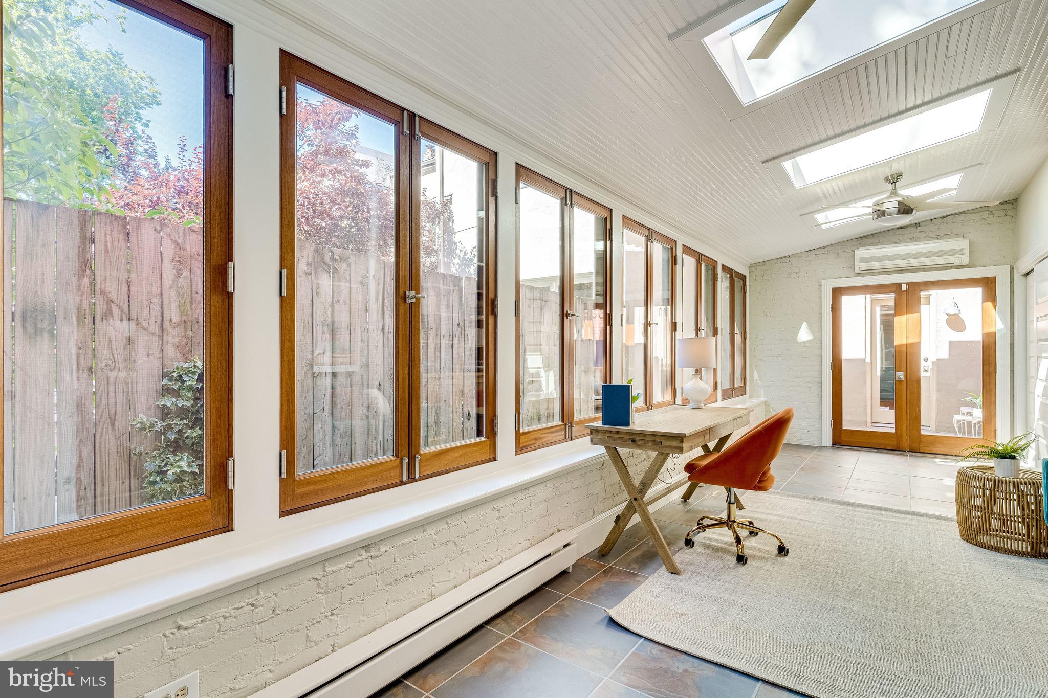 139 12th Street Northeast Washington, DC 20002 - Photo 25 of 50 a living room filled with furniture and a large window