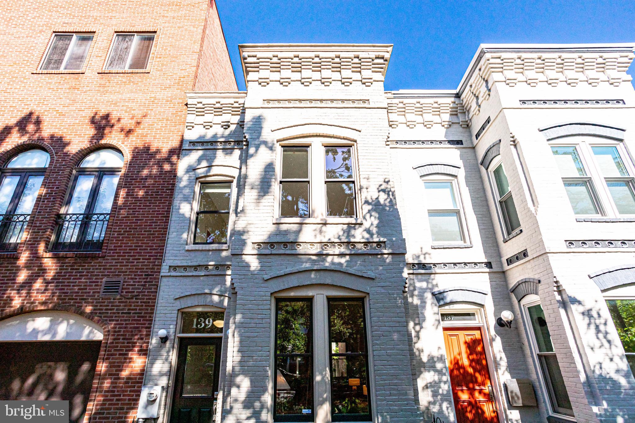 139 12th Street Northeast Washington, DC 20002 - Photo 3 of 50 a view of a building with a lot of windows