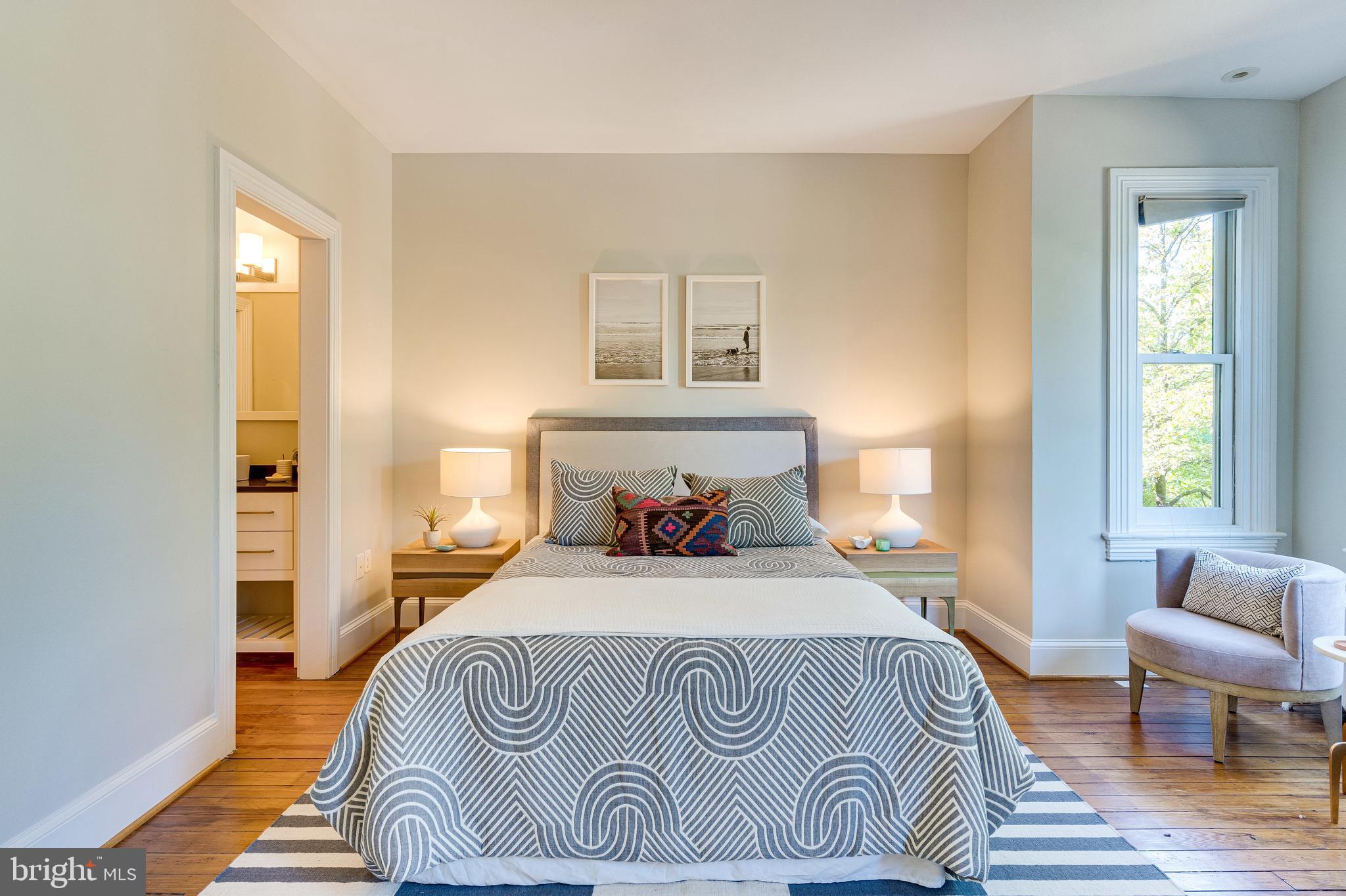 139 12th Street Northeast Washington, DC 20002 - Photo 32 of 50 a bedroom with a bed and wooden floor