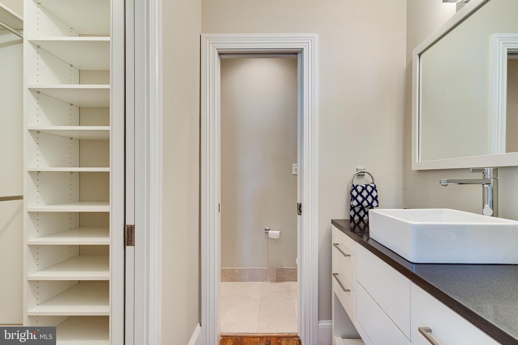 139 12th Street Northeast Washington, DC 20002 - Photo 34 of 50 a bathroom with a sink and a mirror