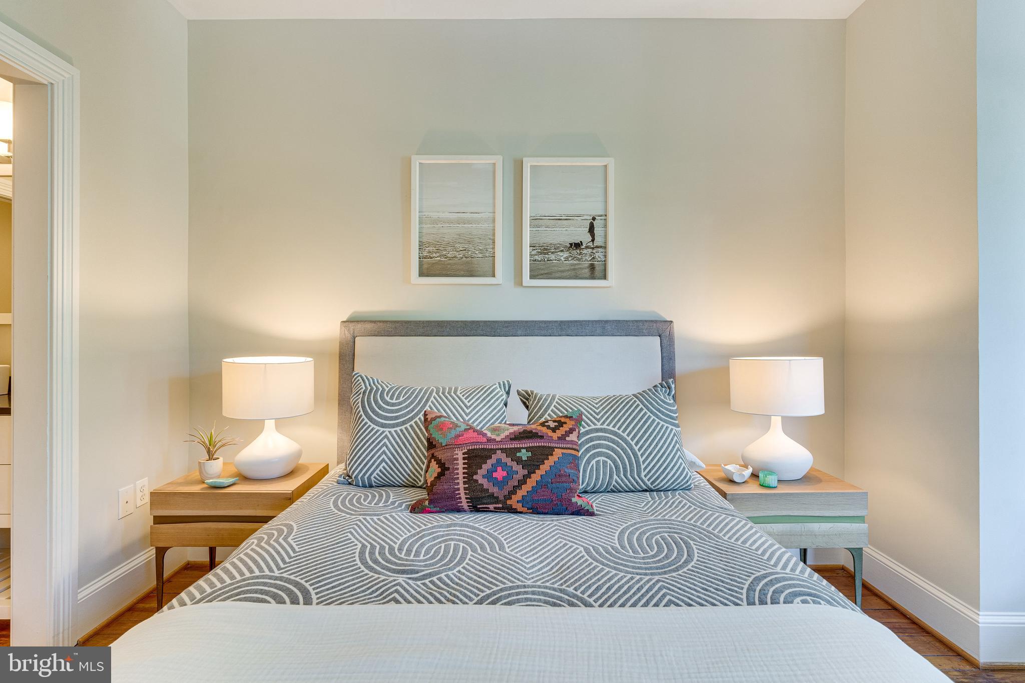 139 12th Street Northeast Washington, DC 20002 - Photo 37 of 50 a bedroom with a bed and lamp