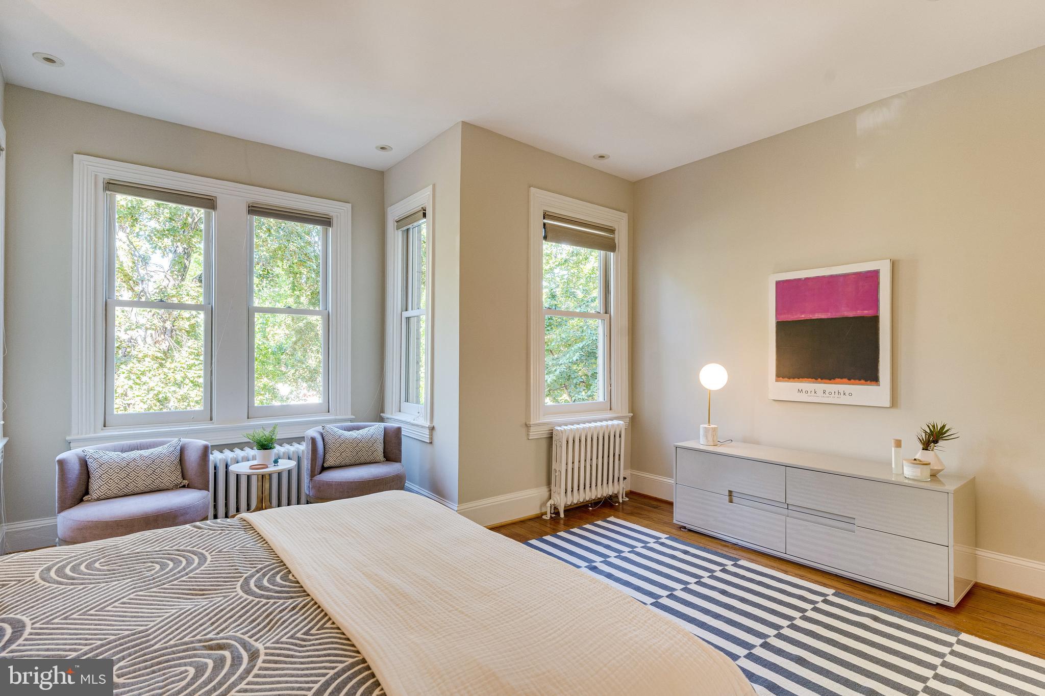 139 12th Street Northeast Washington, DC 20002 - Photo 38 of 50 a bedroom with a bed and a flat screen tv