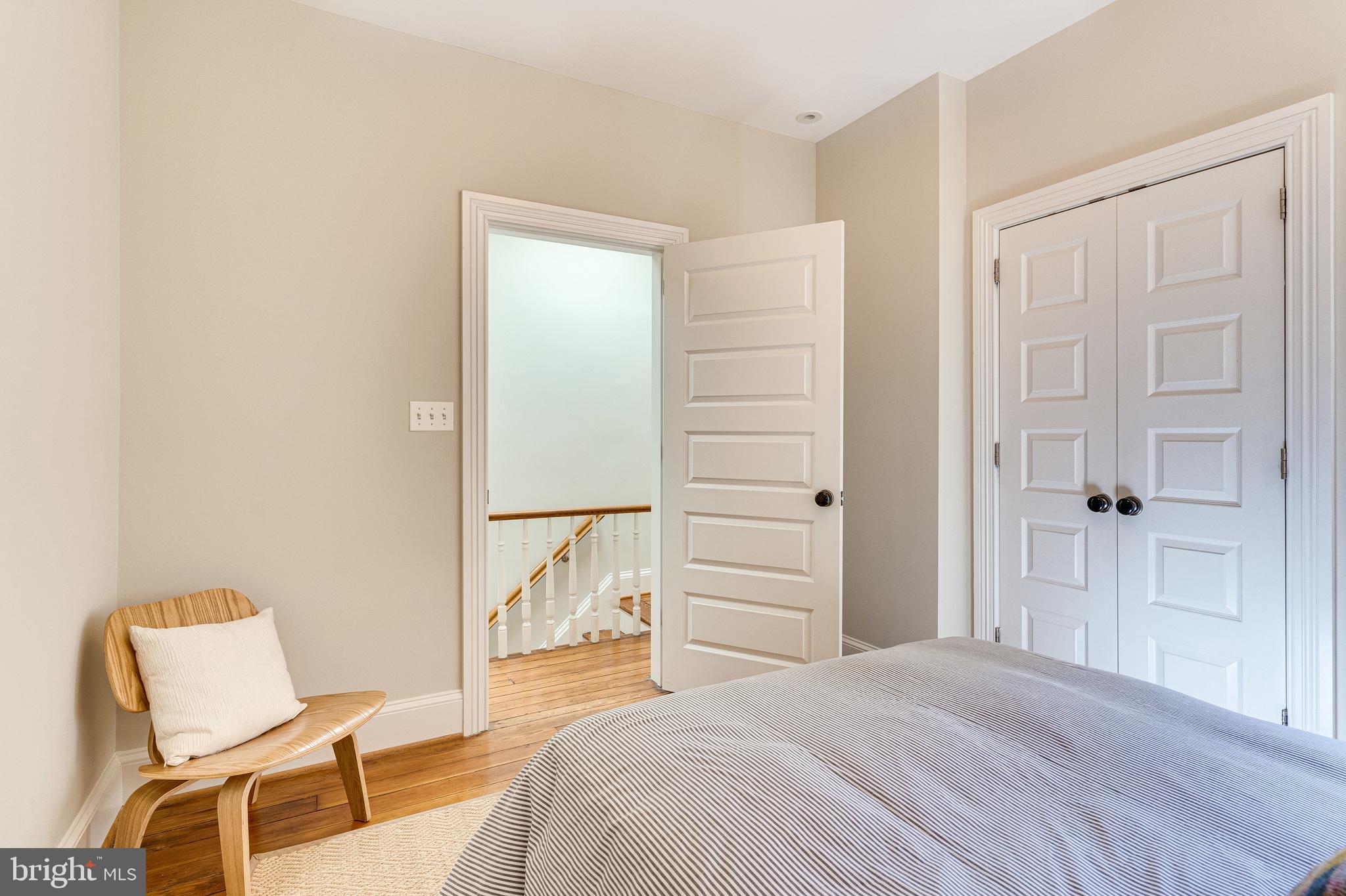 139 12th Street Northeast Washington, DC 20002 - Photo 43 of 50 a bedroom with a bed and chair