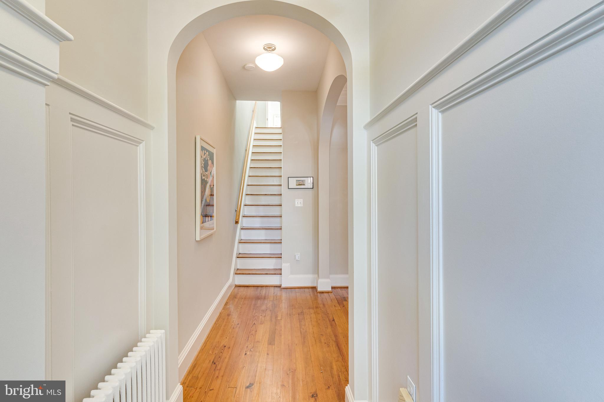 139 12th Street Northeast Washington, DC 20002 - Photo 4 of 50 a view of a hallway with wooden floor and staircase