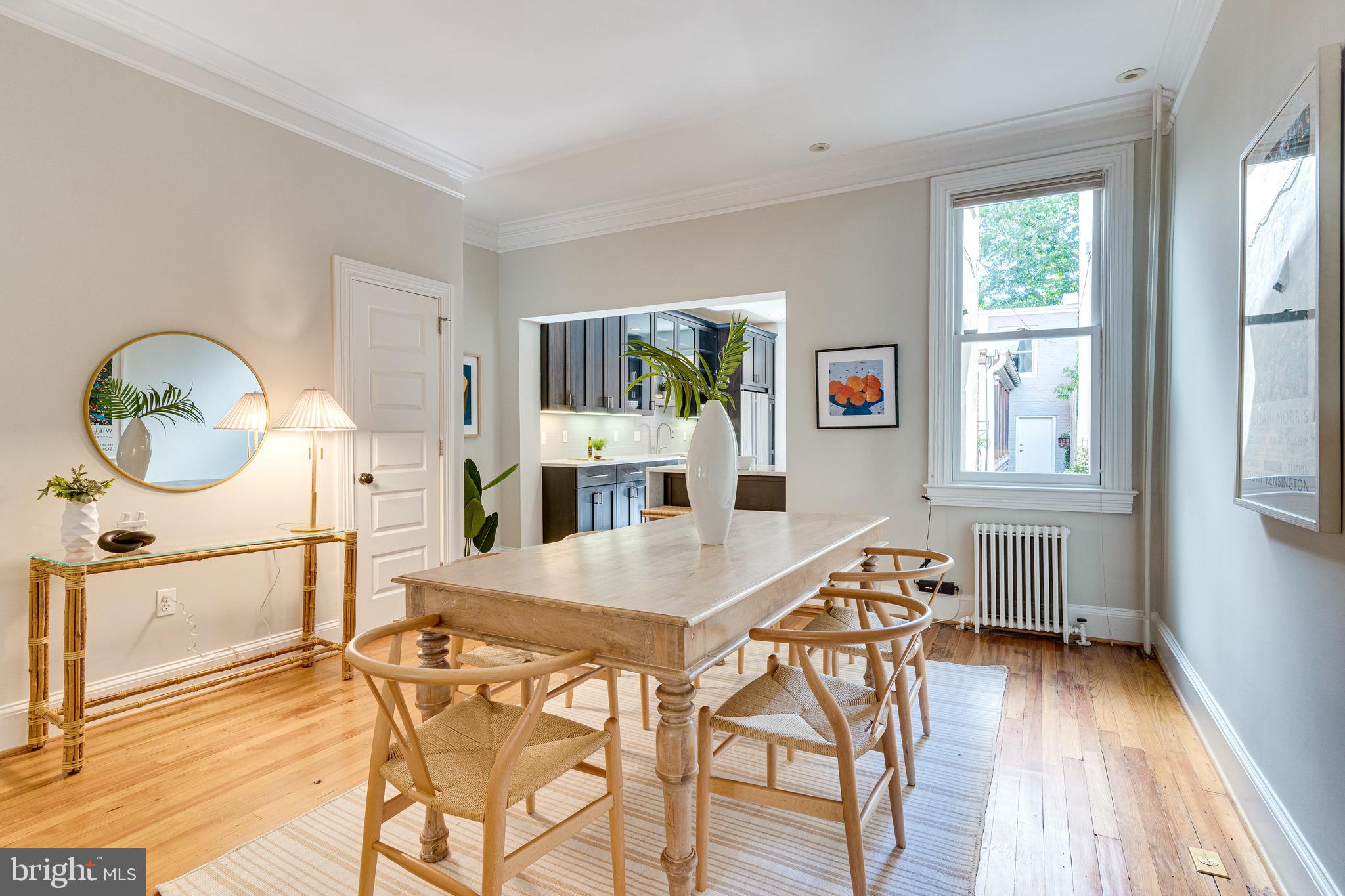 139 12th Street Northeast Washington, DC 20002 - Photo 9 of 50 a view of a dining room with furniture window and wooden floor