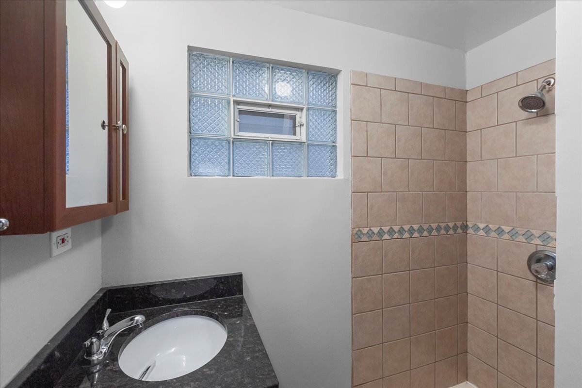 1464 West Ohio Street, Unit 1F Chicago, IL 60642 - Photo 10 of 10 a bathroom with a toilet and a shower