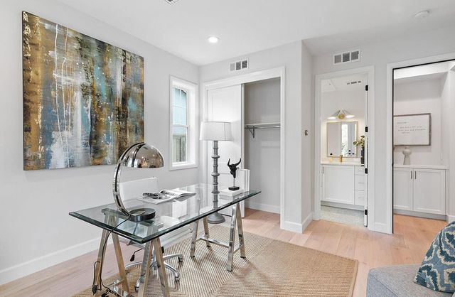 a view of a livingroom with furniture and window