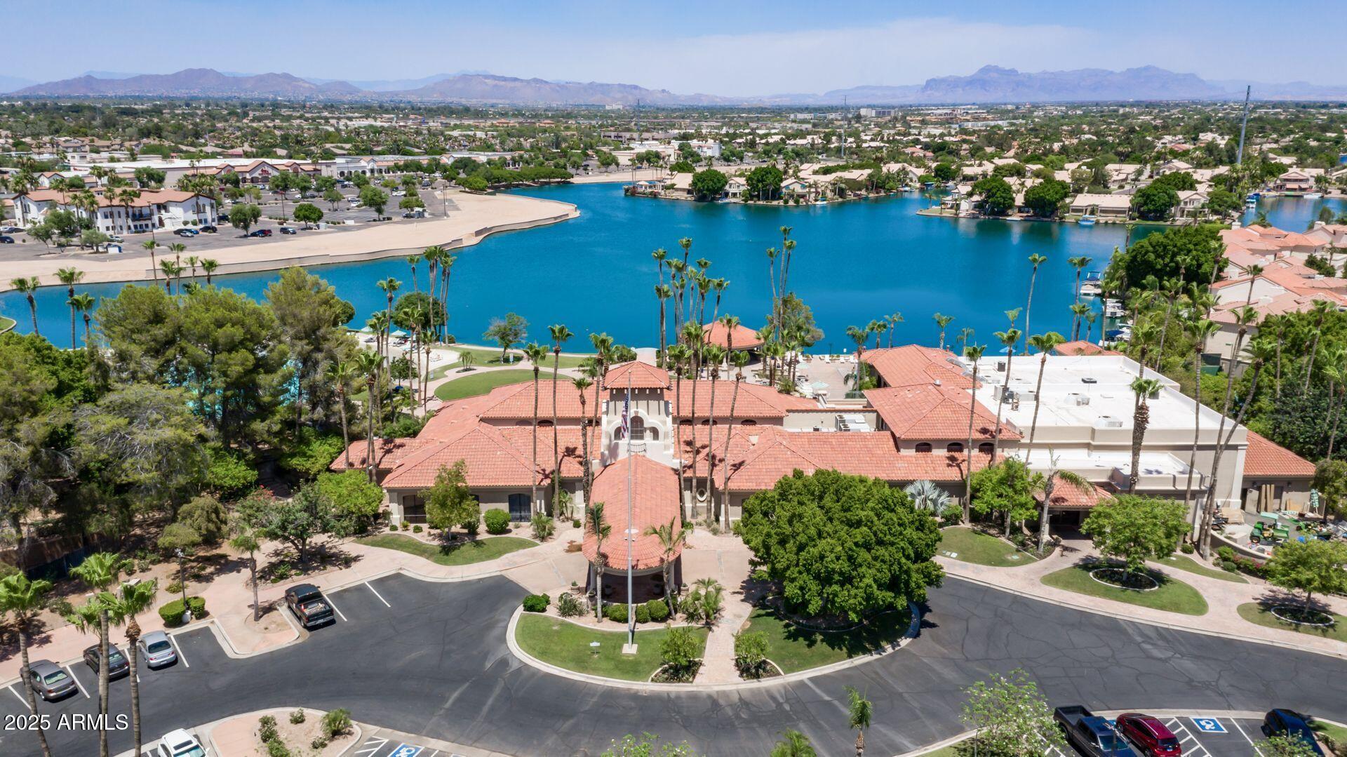 2214 East Beachcomber Drive Gilbert, AZ 85234 - Photo 44 of 45 an aerial view of a house with a garden and lake view