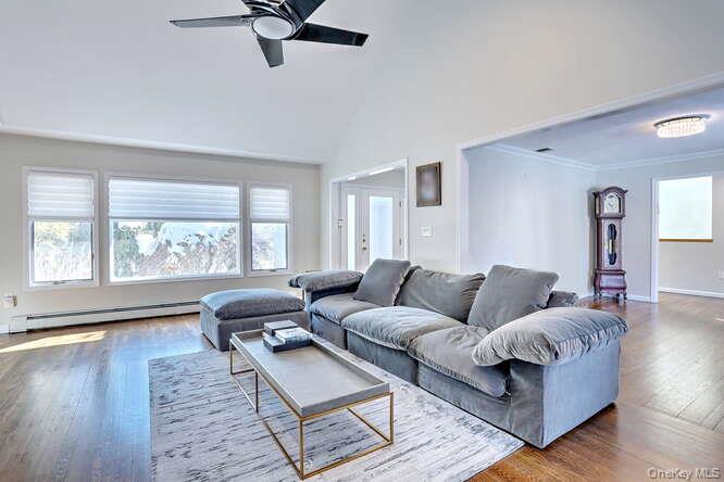 89 Spook Rock Road Suffern, NY 10901 - Photo 9 of 44 a living room with furniture and a large window