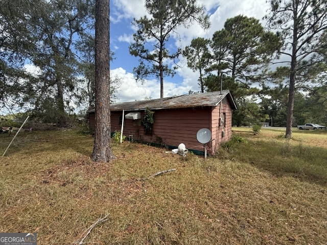 150 Kemp Road Swainsboro, GA 30401 - Photo 12 of 18 a fire hydrant in the middle of a field