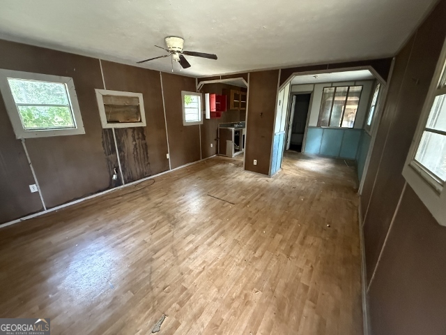 150 Kemp Road Swainsboro, GA 30401 - Photo 14 of 18 wooden floor in an empty room with a window