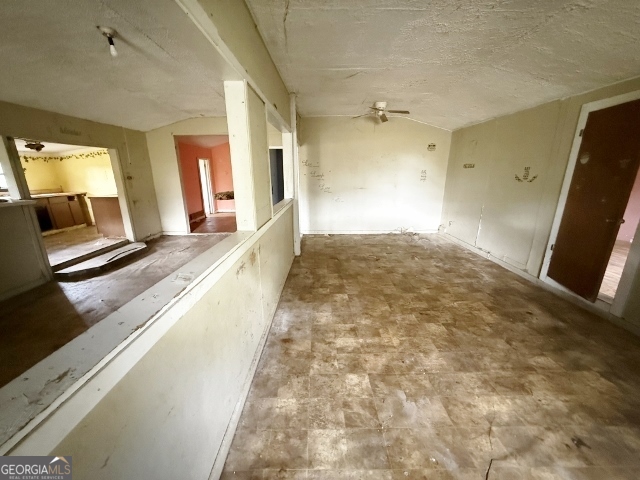150 Kemp Road Swainsboro, GA 30401 - Photo 4 of 18 a view of a living room with a large window