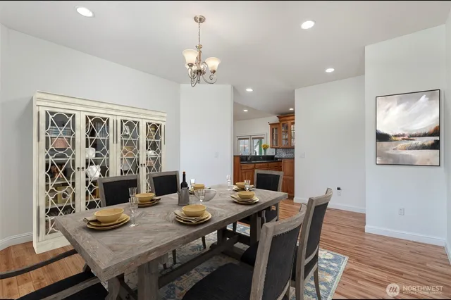 a spacious bedroom with a bed and a couch