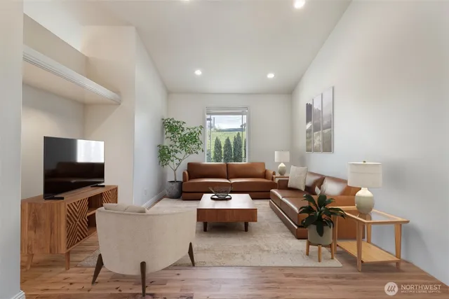 a living room with furniture and a table