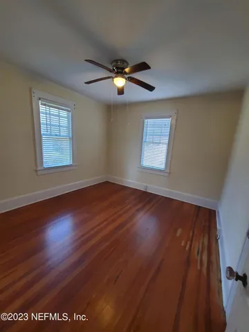 a view of a living room and dining room
