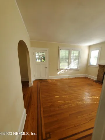 a view of an empty room and window