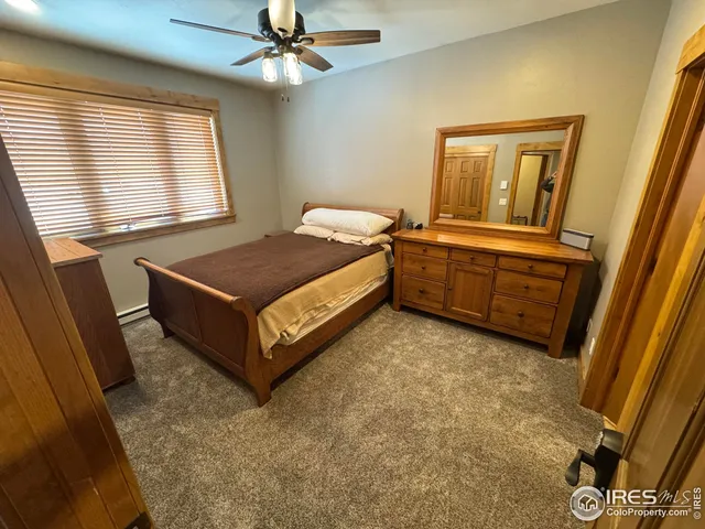 a room with bed and a window