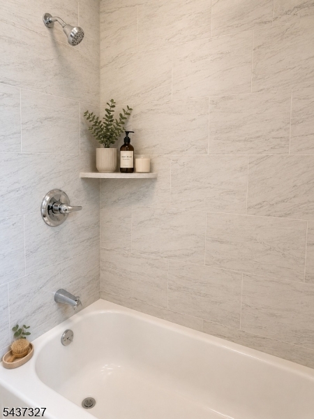 255 Main Street Madison, NJ 07940 - Photo 6 of 9 a bathroom with a bathtub