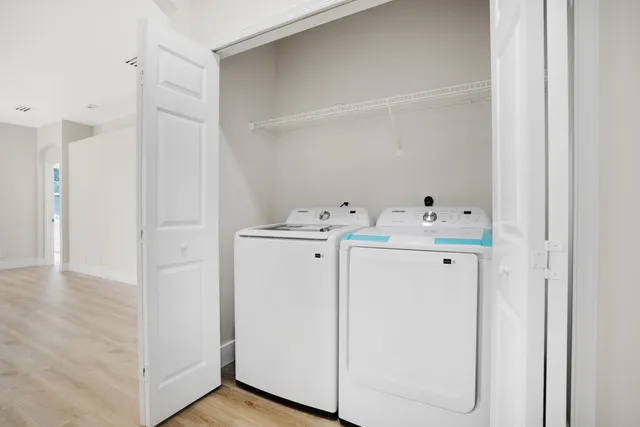 a utility room with dryer and washer