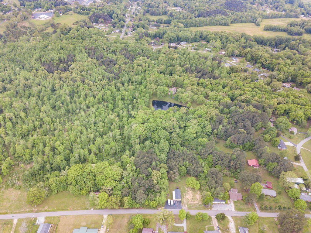 876 Flatwoods Road Camden, TN 38320 - Photo 11 of 47 a view of a yard with an outdoor space