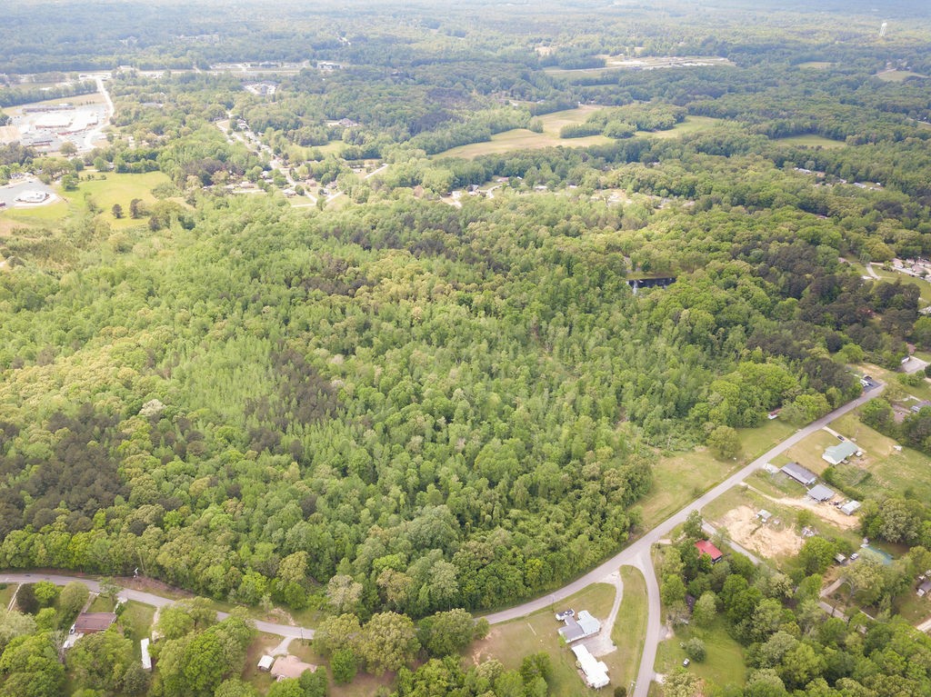 876 Flatwoods Road Camden, TN 38320 - Photo 20 of 47 a view of a field with an outdoor space