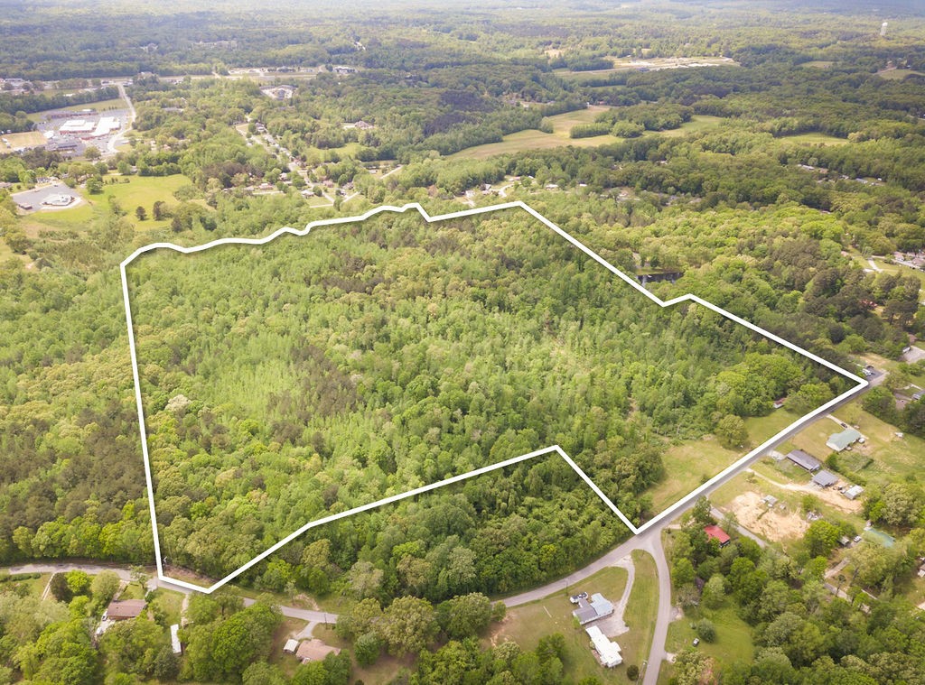 876 Flatwoods Road Camden, TN 38320 - Photo 2 of 47 a view of a tennis court