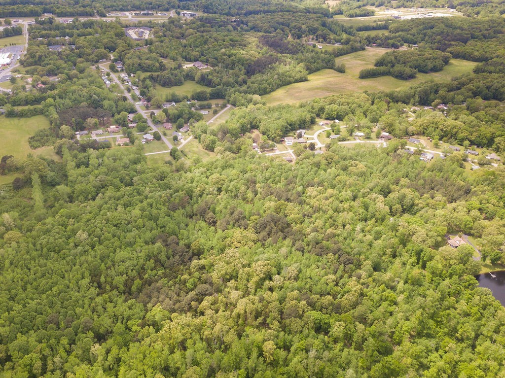 876 Flatwoods Road Camden, TN 38320 - Photo 24 of 47 a view of a bunch of trees and bushes