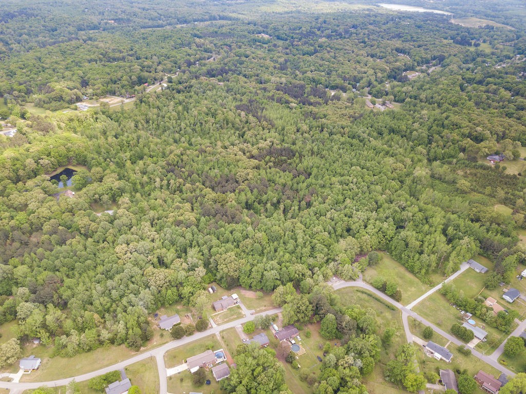 876 Flatwoods Road Camden, TN 38320 - Photo 38 of 47 a view of a yard with an outdoor space